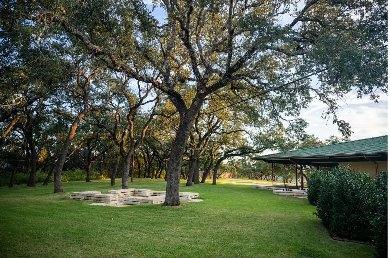 Long banquet table setup under the Pavilion — seated dinner